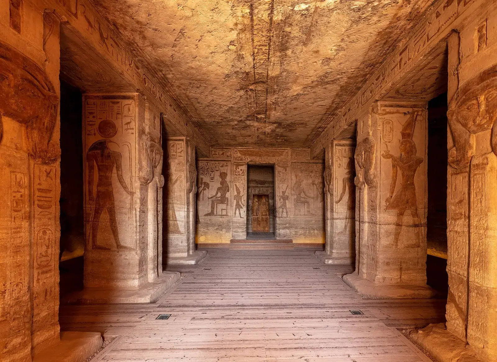 Colossal statues of Nefertari and Ramses II on the facade of the Small Temple of Hathor at Abu Simbel