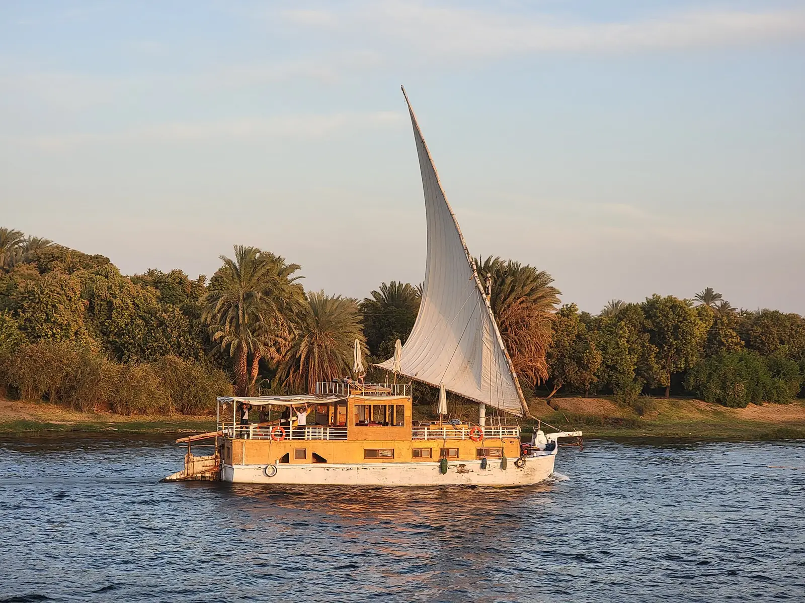 A dahabiya sailing boat moored on the Nile in Upper Egypt