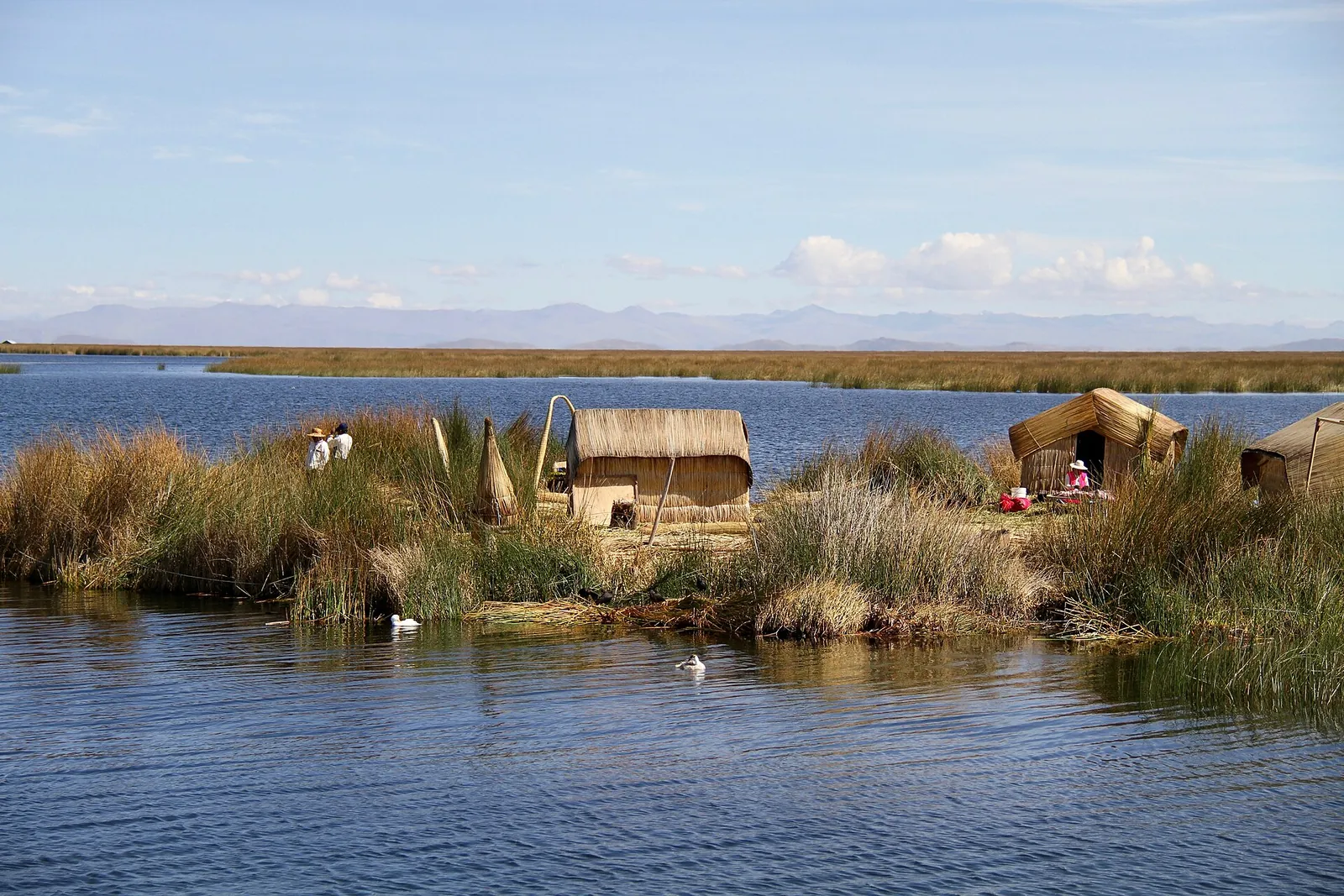 Reed houses on a floating Uros island in Lake Titicaca, Peru