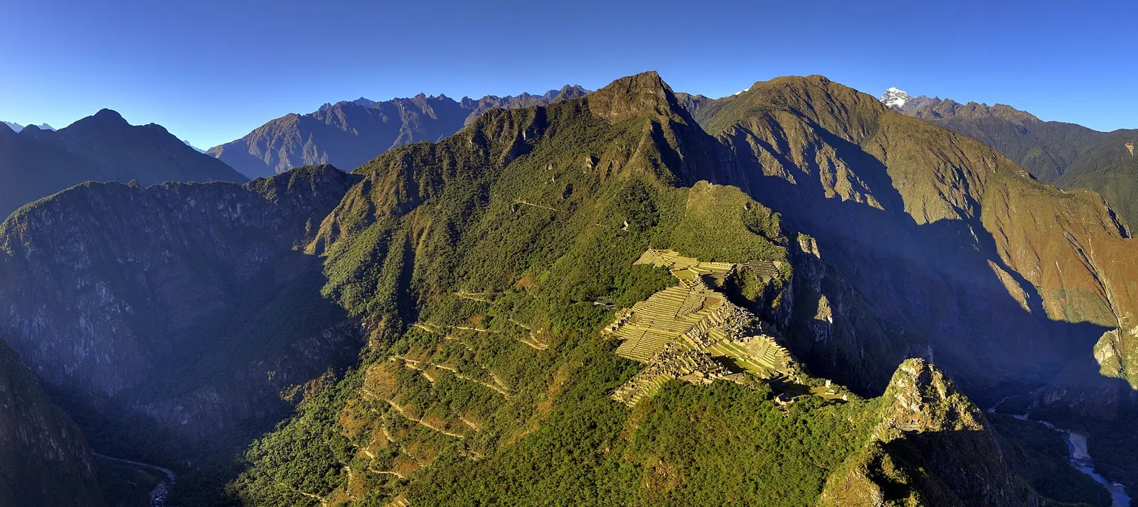 Machu Picchu ruins and terraces with Huayna Picchu peak behind, Peru