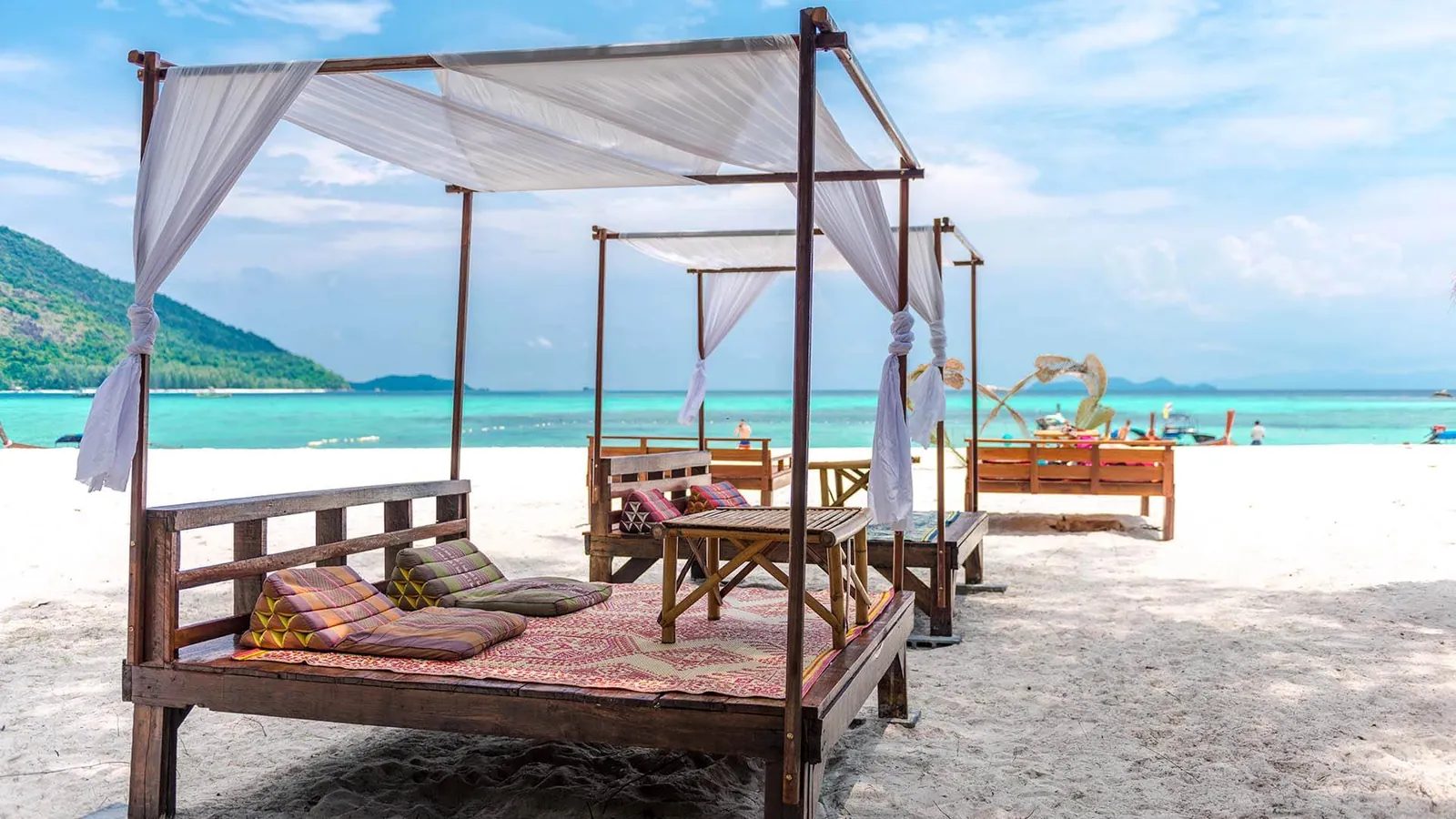 Shaded daybeds on the white sand beach of Koh Lipe in the Andaman Sea, Satun
